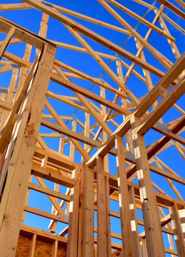 Wood frame residential structure under construction.